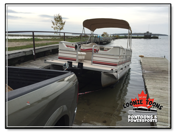 Loonie Toons Pontoons and Power Sports Pontoon Boat Trailering Service Vehicle launching Pontoon Boat